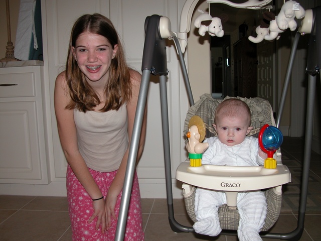 A barely awake Aunt Kate poses with Paige...