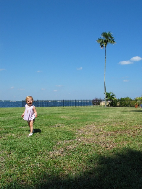 Paige-E enjoying the yard. ;)  She was screaming DADA DADA DADA when this photo was taken.