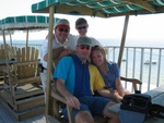 The whole crew - up 6 stories looking out over the Gulf.