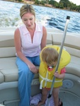 ...Paige-E shows Meg how to prepare the boat for departure.