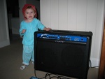 ...I've become quite the musician.  Here I am next to my 120 Watt Crate Guitar Amp, you should hear me shred it up on the electric guitar!