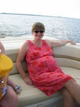 Tara is 7 months pregnant, enjoying the boat ride.