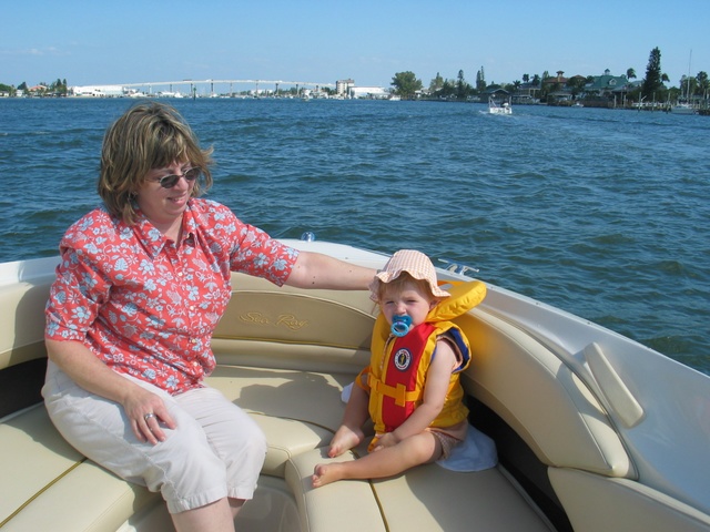 In the background, the Fort Myers Beach bridge...  In the foreground, Paige-E relaxes with Gramma.