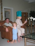 An interesting shot of Paige, Dad & Gramma! :)  Is that a bag Gramma is wearing on her head?