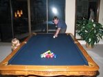 ...Don show Paige how to play pool...