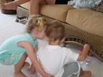 "Let me help you up!"  (Paige is trying to pick Connor up to go to the playroom).  Bye bye, hope you enjoyed our photos!