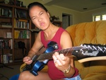 ROCK N ROLL - Amy plays lead guitar.