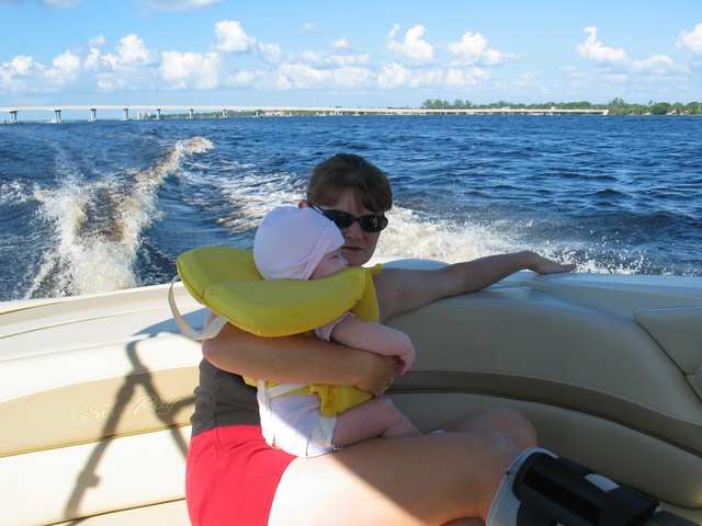 Josie admires the shoreline with mom.