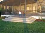 Paige is showing off the new stairs by the lanai.