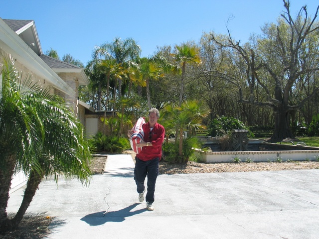 While saying "Num nums!" to the animals, Alan brings a big 50lb bag of treats. :)