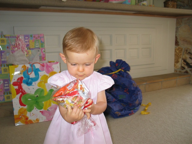 The first thing she finds is the Goldfish crackers (she loves food, has since before she was born - used to make mom eat all of the time!)  