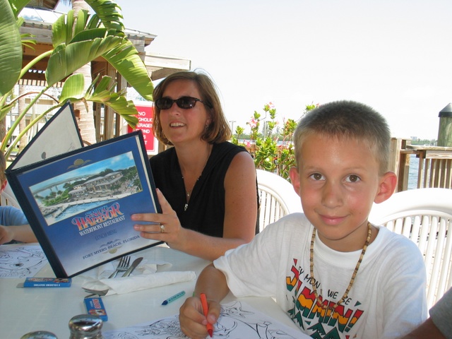 Drew smiles while mom (Alice) looks over the menu. ;)