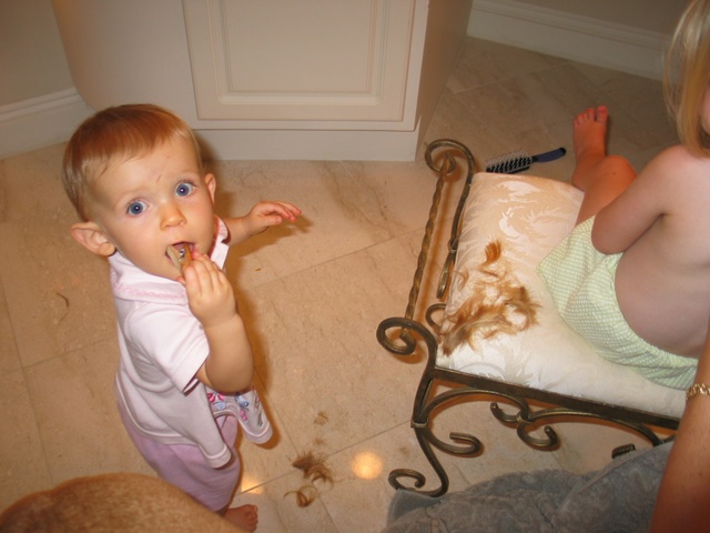 Josie is on stand-by assuring that if mom happens to need a clothespin, she has one near-by.