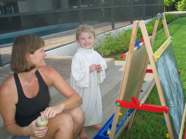 Paige got an easel for her birthday (birthday photos will be up soon via Dan Laursen!), here she is showing Mom & Grandma Marty (not in this photo) how she paints!