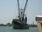 As we arrived at our destination (Fort Myers Beach - back-side - Snug Harbor) we saw this Shrimp boat heading out to sea.