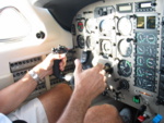 As we progress toward the runway, Steve presses the PTT button (Push To Talk) to get clearance...