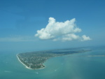 One of my favorite shots!  Sanibel with a big cloud over it!