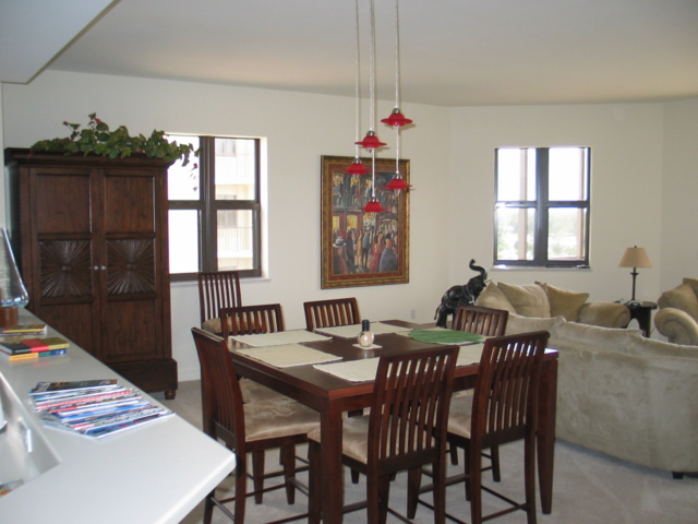 The gathering table, Paige & Josie's armoire (with toys, games, and other fun stuff) is on the left.