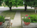 A view down from the front porch -- we used to watch the parades from up here!