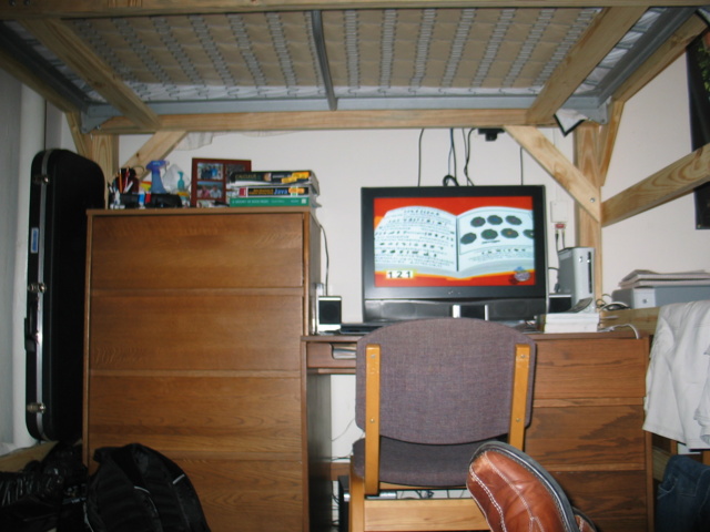 He has a flat screen with a surround setup underneath the beds - pretty cool!