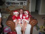 Mom took Paige & Josie away for a bit and they came back as Santa's elves!   Here's Daddy, JoJo & Paige!