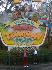 After the Carousel, we hit Toontown!  Here's Paige & Josie in front of the sign!