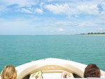 ...up front to enjoy the view from the bow.  On this part of Captiva, the water is deep real close to shore, so we slowed down and got close to the beach.