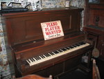 On the way out I snapped this photo of the Piano.  If you are good or bad, you can have a job playing for the everyone here!