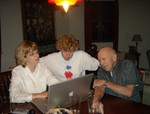 Marty shows off her cool Macbook Pro to Deb & Gramps!