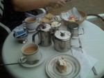 ...complete with tea, jam, scones, and real cream (similar to whipped butter!)  It was...