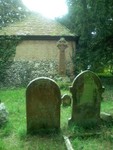 ...Mel found this to be quite interesting -- a Celtic cross tombstone in the midst of everything.