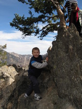 Samuel decided it'd be fun to climb on the rocks!