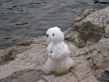 Aw, someone made a mini-snow person!