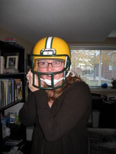 After the Museum, we went back to Aunti D's and hung out with Samuel & crew - Melanie decided to become a Green Bay Packer and put Samuel's helmet on. ;)