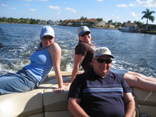 A beautiful day for boating - here's daddy Doug with his lovely daughers. ;)