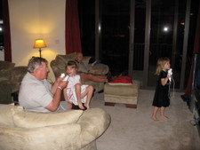 After a delicious dinner -- the girls talked Grandpa Doug into playing Wii Boxing.  Here, Josie and Doug battle it out.  