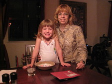 Awww, JoJo with Grandma Marty working on Josie's candy necklace!