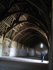 Considerably bigger than the Tithe Barn in Lacock!