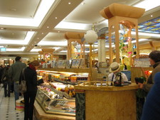 It was cold & rainy today, so we hopped around the different stores.  Here we are in Harrod's...