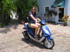 Dale rented a scooter for his birthday, and Donna modeled it!