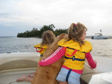 Now it's JoJo, Tucker and Paige enjoying the view through one of the minimum wake zones!