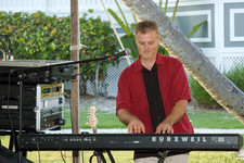 Alex, Wendy's husband, playing practically every instrument at one point throughout the night.