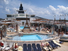 Deck 11 looking down to Deck 10 over the pools, and hot tubs.