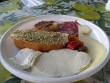 Up on the mountains of Sorrento, they literally made the cheeses just before we sat down. ;)  Delicious! 