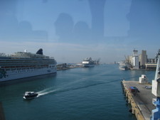 After being picked up at the airport by Celebrity Cruises, we were taken to the port!  There's a boat in the back!