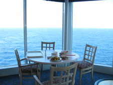 Here's lunch, deck 10, looking out over the Mediterranean.  Notice the hole in the floor.  Once Melanie discovered that, she sat on the other side of the table (haha!)