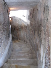 A good shot of the bulk of the climb/descent in the tower.  Marble stairs just inside of the walls.  It doesn't get into the small spiral staircase until you get up to the top.