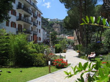 A beautiful view from a park in Sorrento toward the mountains.  

Check out the hotel up on the top of mountain.