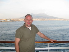 After Naples, Sorrento & Pompeii, we boarded the ship, and Melanie snapped this photo of Charly standing in front of Mount Vesuvius.