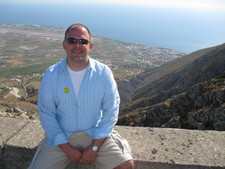 Here I am chillin' with the tourist tag on, today we're part of excursion #9!  

You can see the airfield to the left of my head.